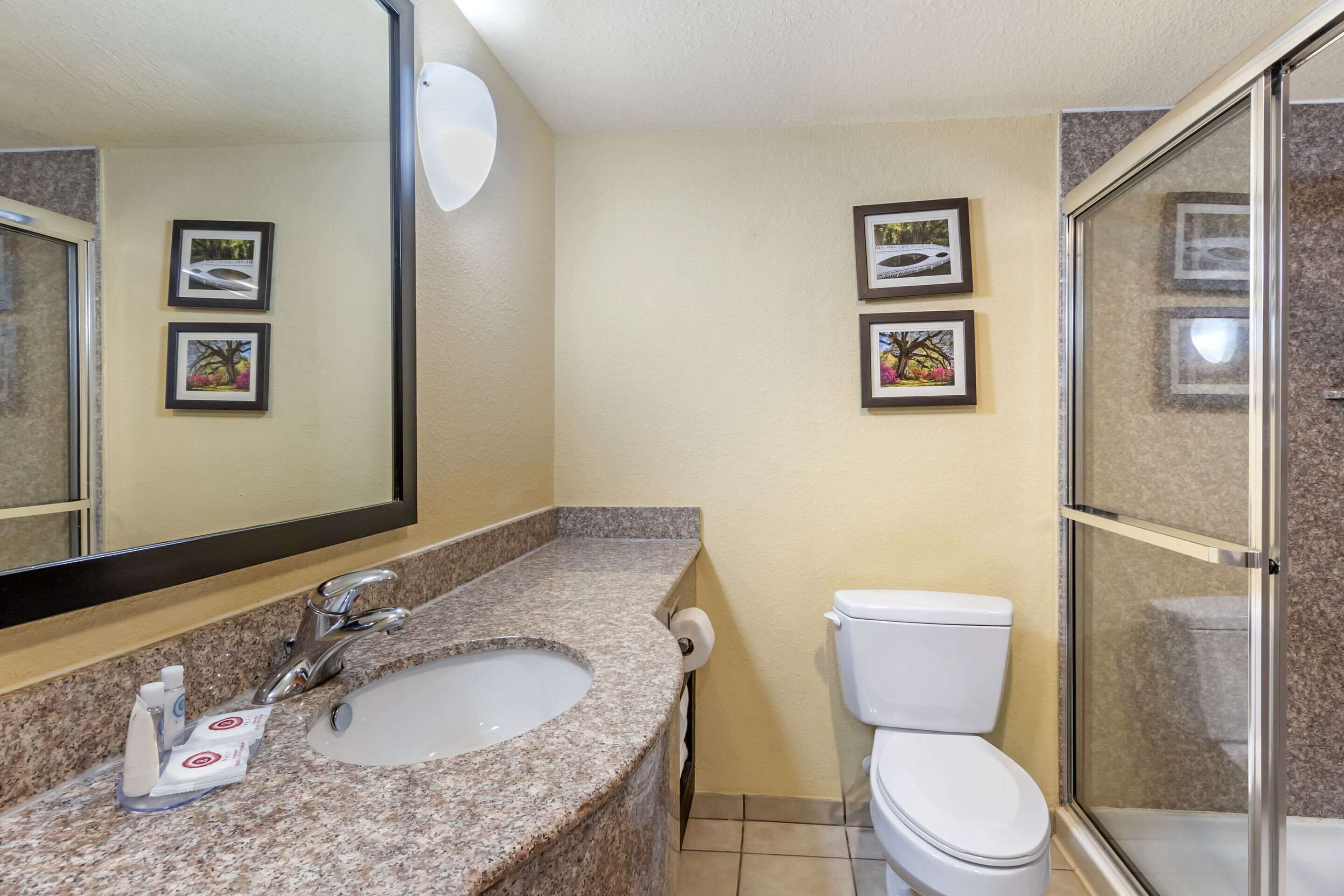 shower, rainfall showerhead, hair dryer, slippers