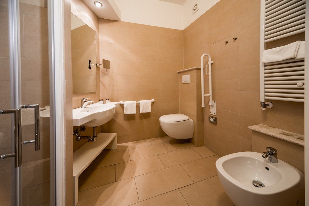 superior double room | bathroom | hair dryer, towels