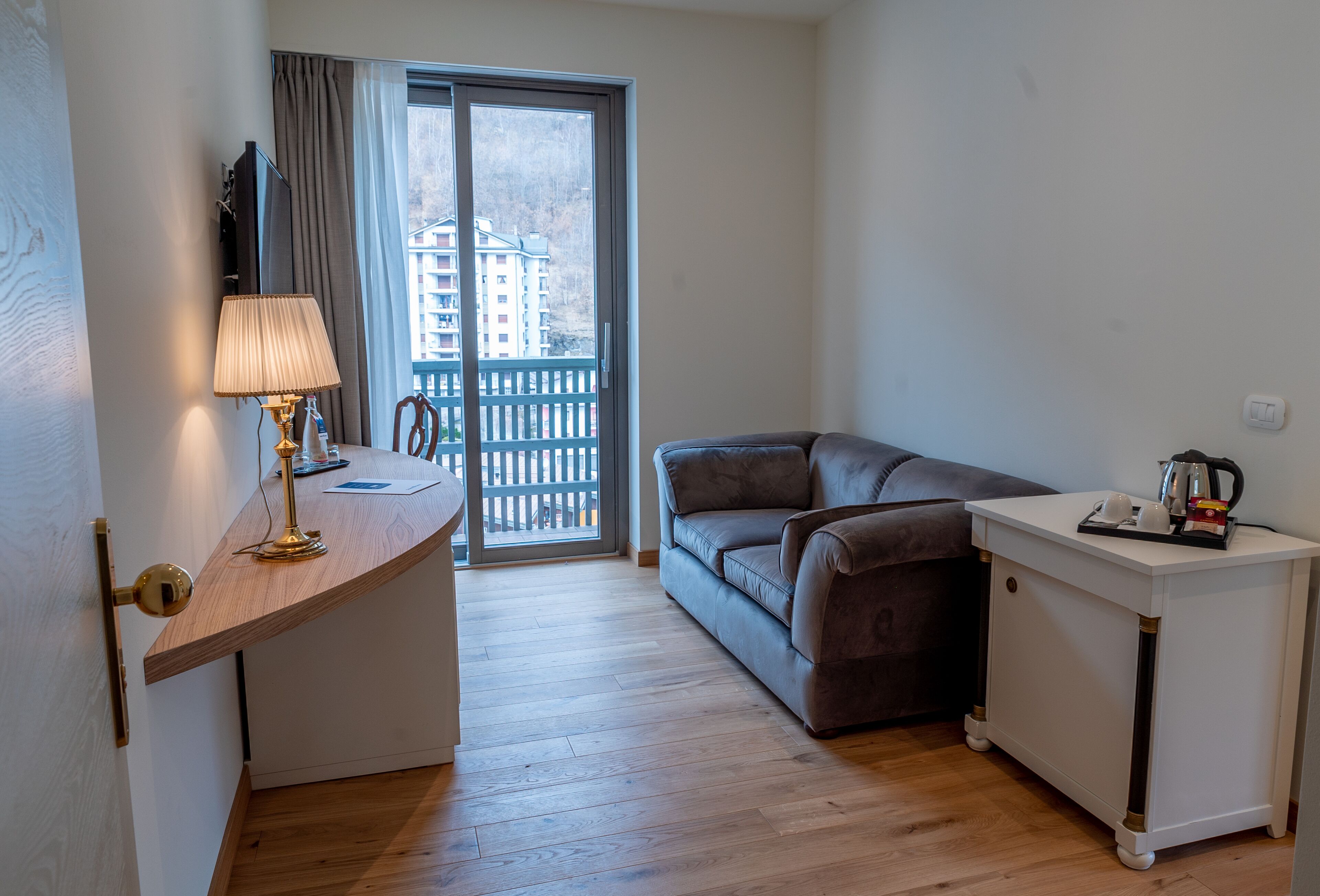 family suite, 1 bedroom | living room | 25-inch flat-screen tv with digital channels, tv