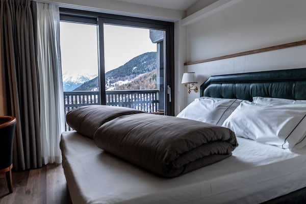 1 Schlafzimmer, hochwertige Bettwaren, Daunenbettdecken, Minibar