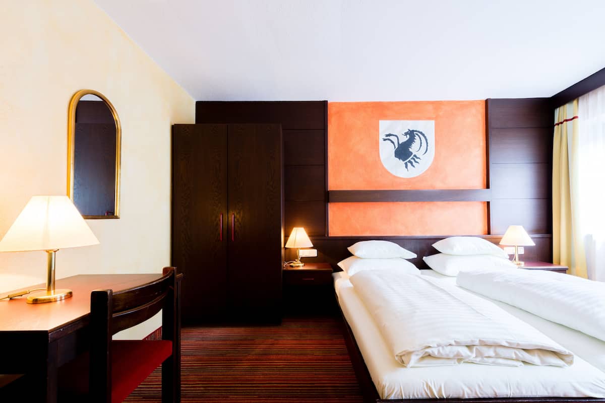 economy double or twin room | in-room safe, desk, free wifi, bed sheets