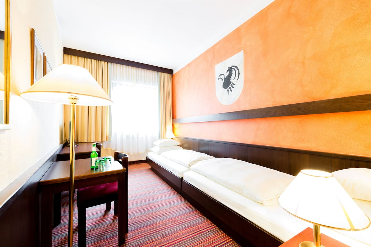 economy double or twin room | in-room safe, desk, free wifi, bed sheets