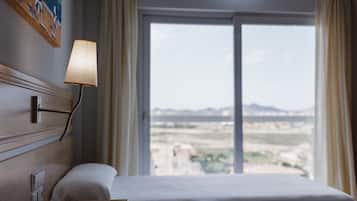 Standard Room, Multiple Beds, Terrace | 1 bedroom, in-room safe, desk, laptop workspace