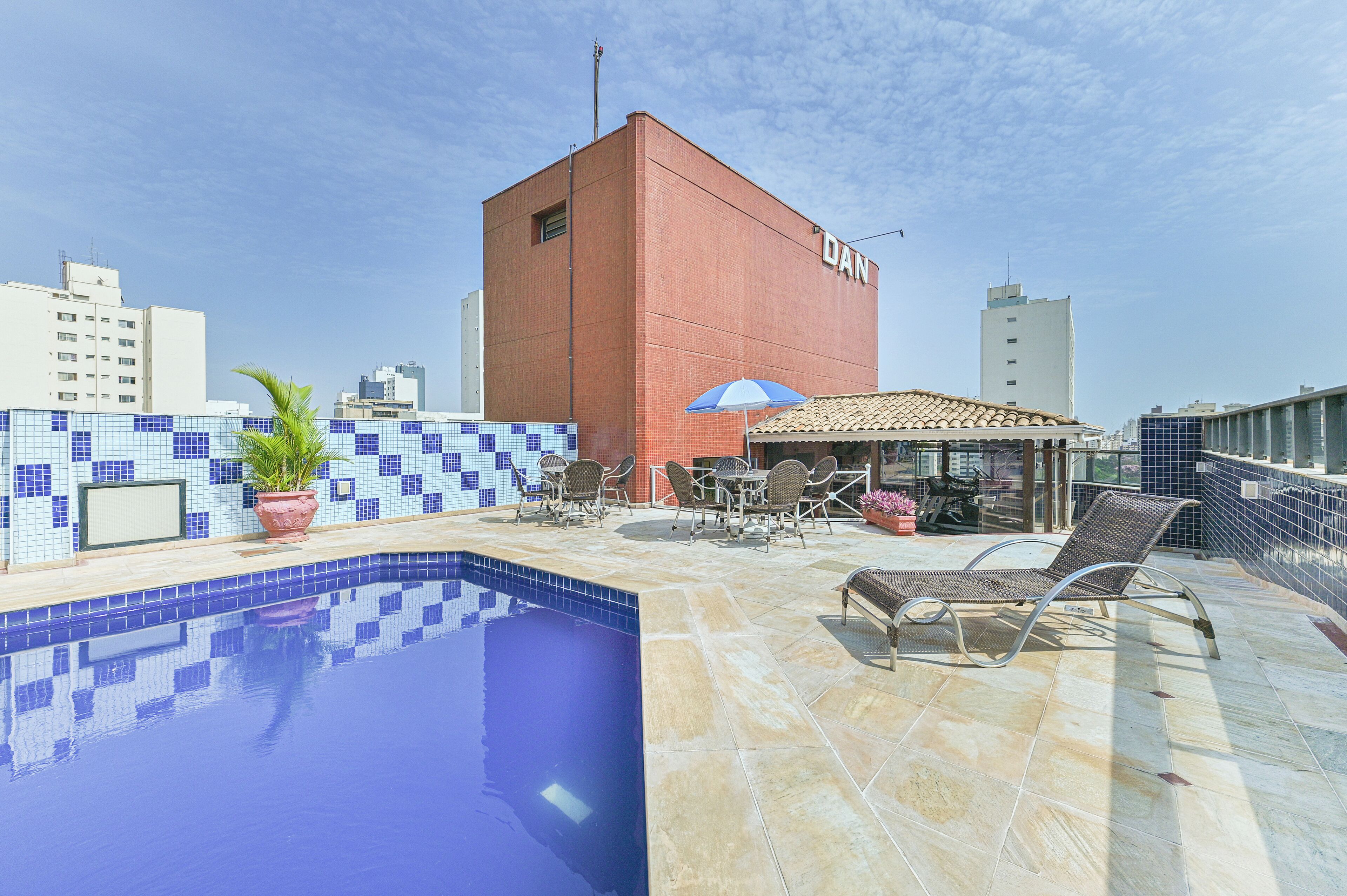 outdoor pool, pool umbrellas, pool loungers