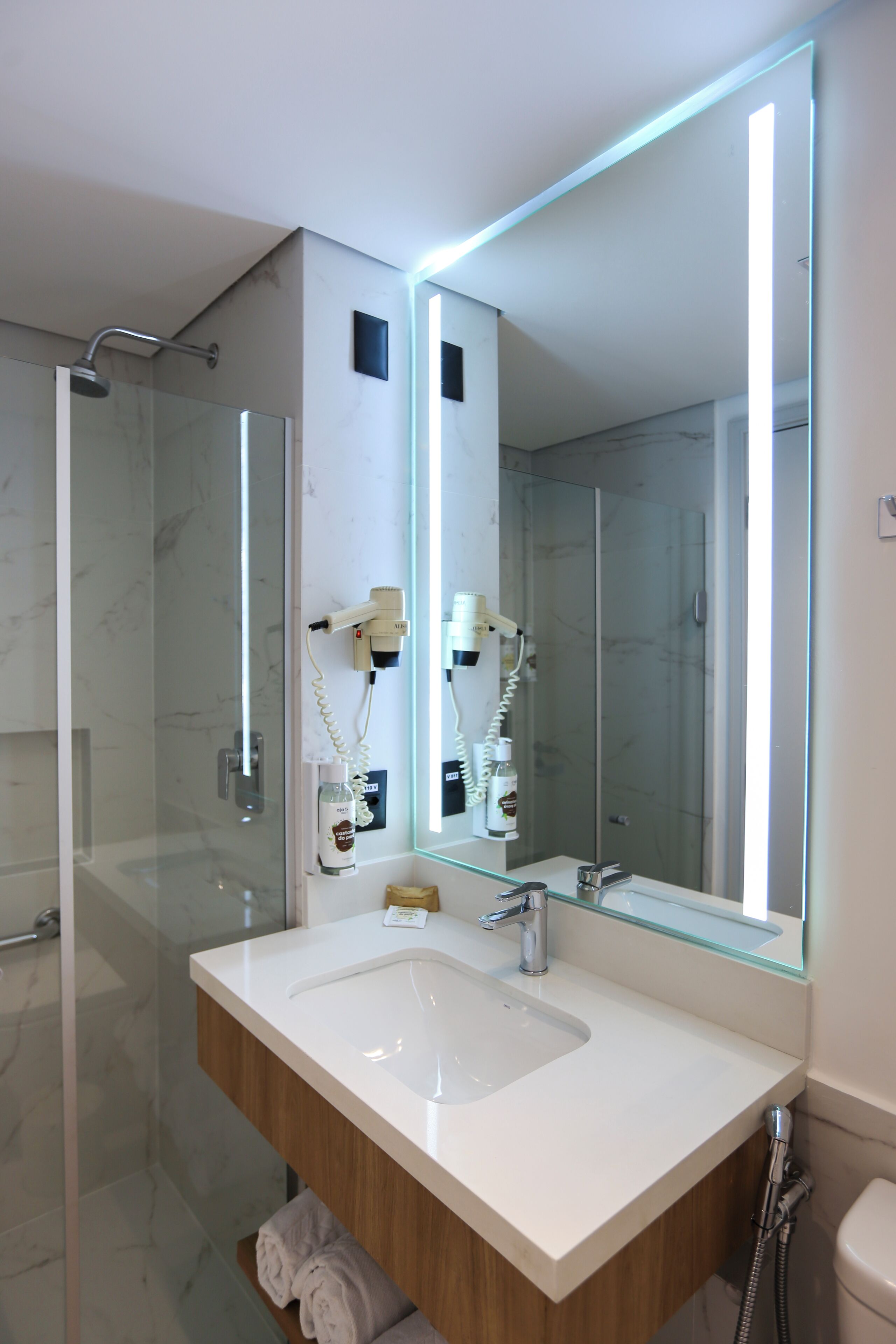 Shower, free toiletries, hair dryer, towels