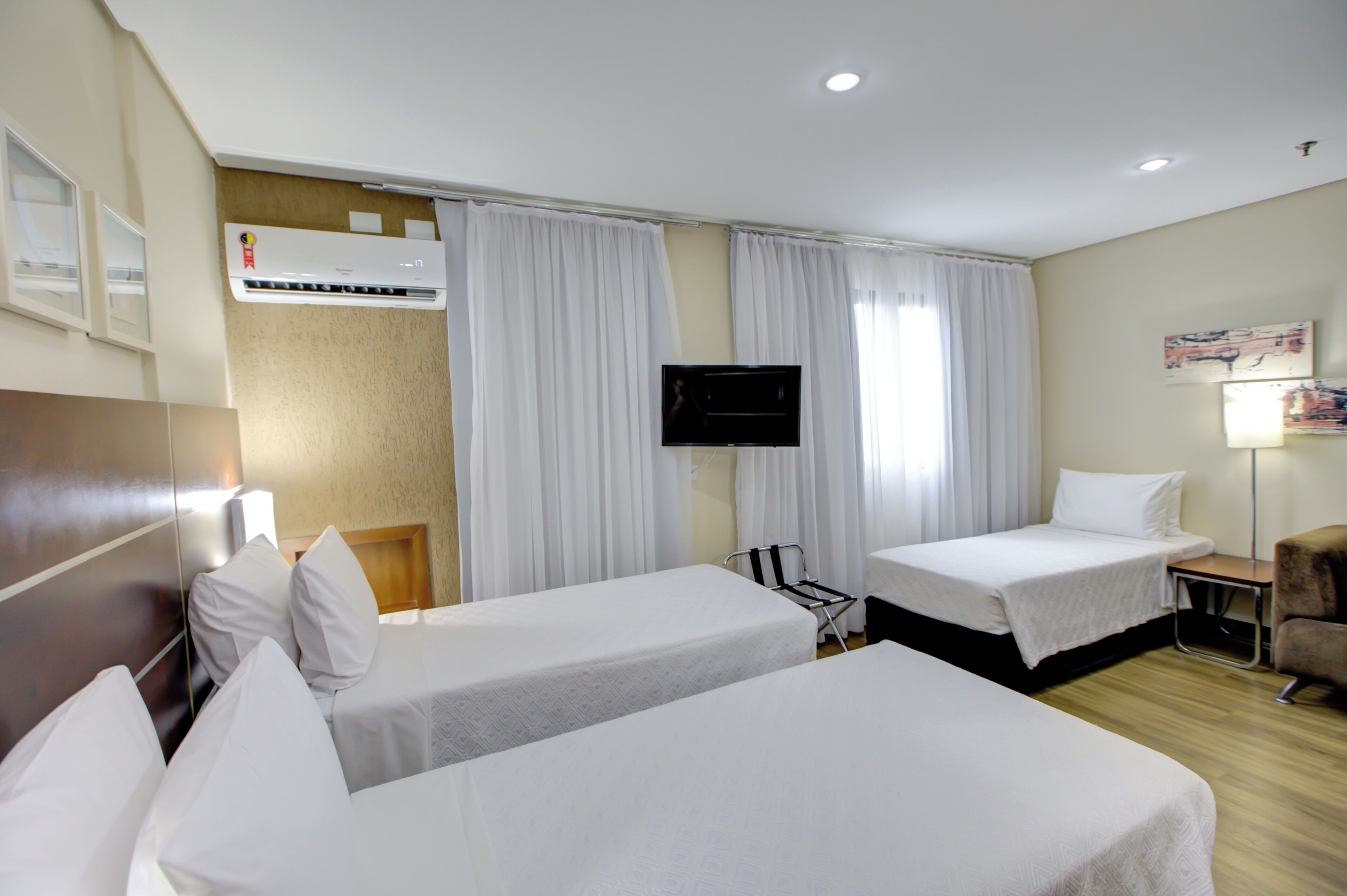 Standard Triple Room, 3 Twin Beds | Minibar, in-room safe, desk, laptop workspace