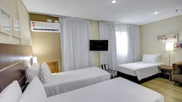 Standard Triple Room, 3 Twin Beds | Minibar, in-room safe, desk, laptop workspace