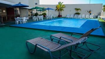 Outdoor pool, pool umbrellas, pool loungers