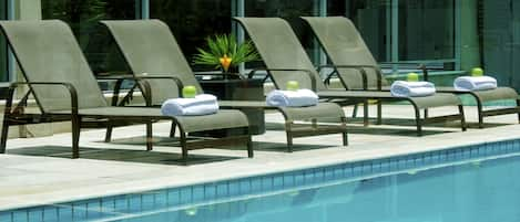 Outdoor pool, pool umbrellas, sun loungers