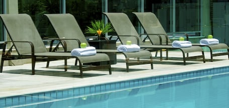 Outdoor pool, pool umbrellas, sun loungers