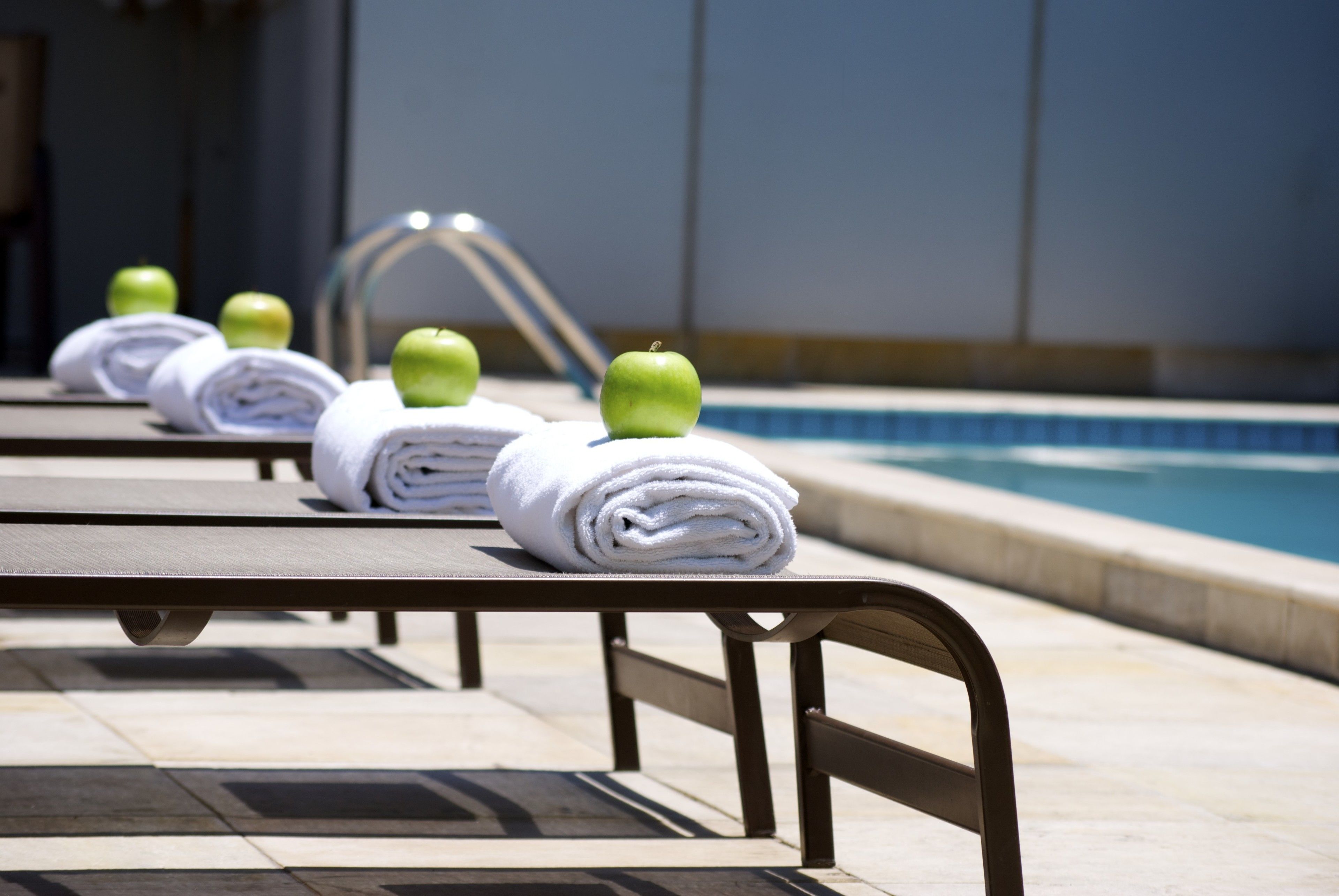 outdoor pool, pool umbrellas, pool loungers