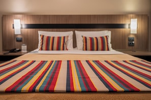 Deluxe Room | Minibar, individually decorated, blackout drapes, free WiFi