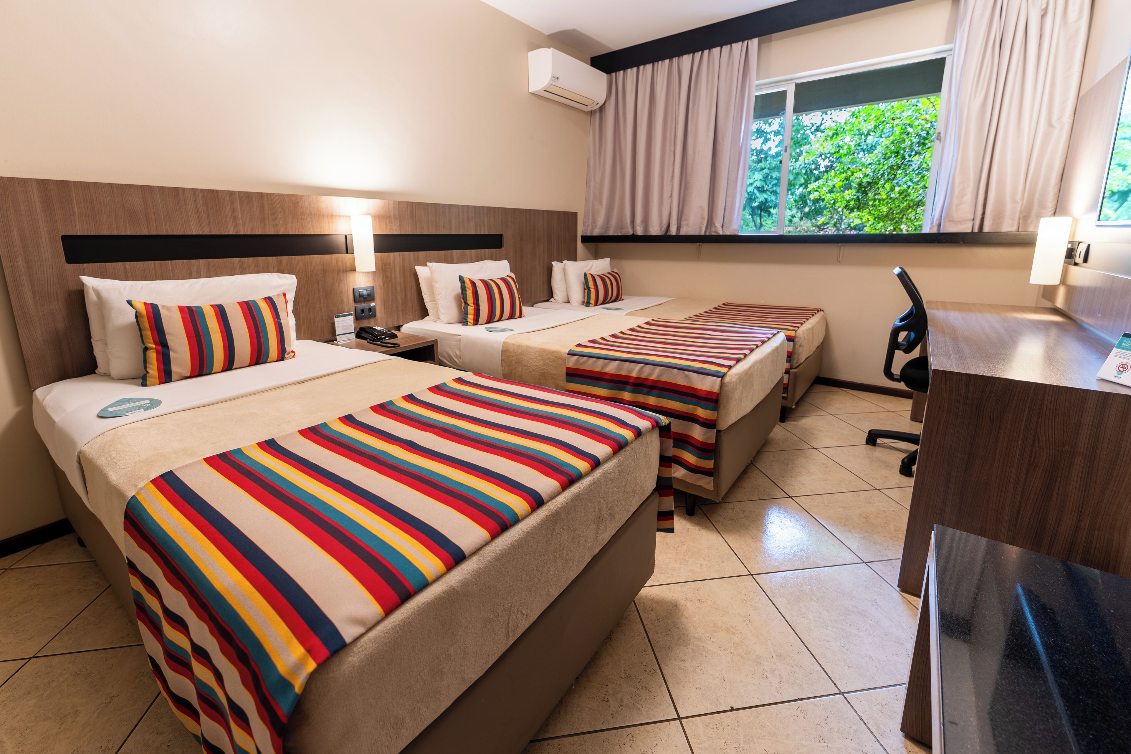 deluxe triple room | 1 bedroom, minibar, individually decorated, blackout curtains