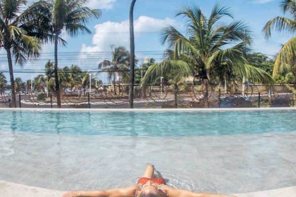 Outdoor pool, pool umbrellas, sun loungers