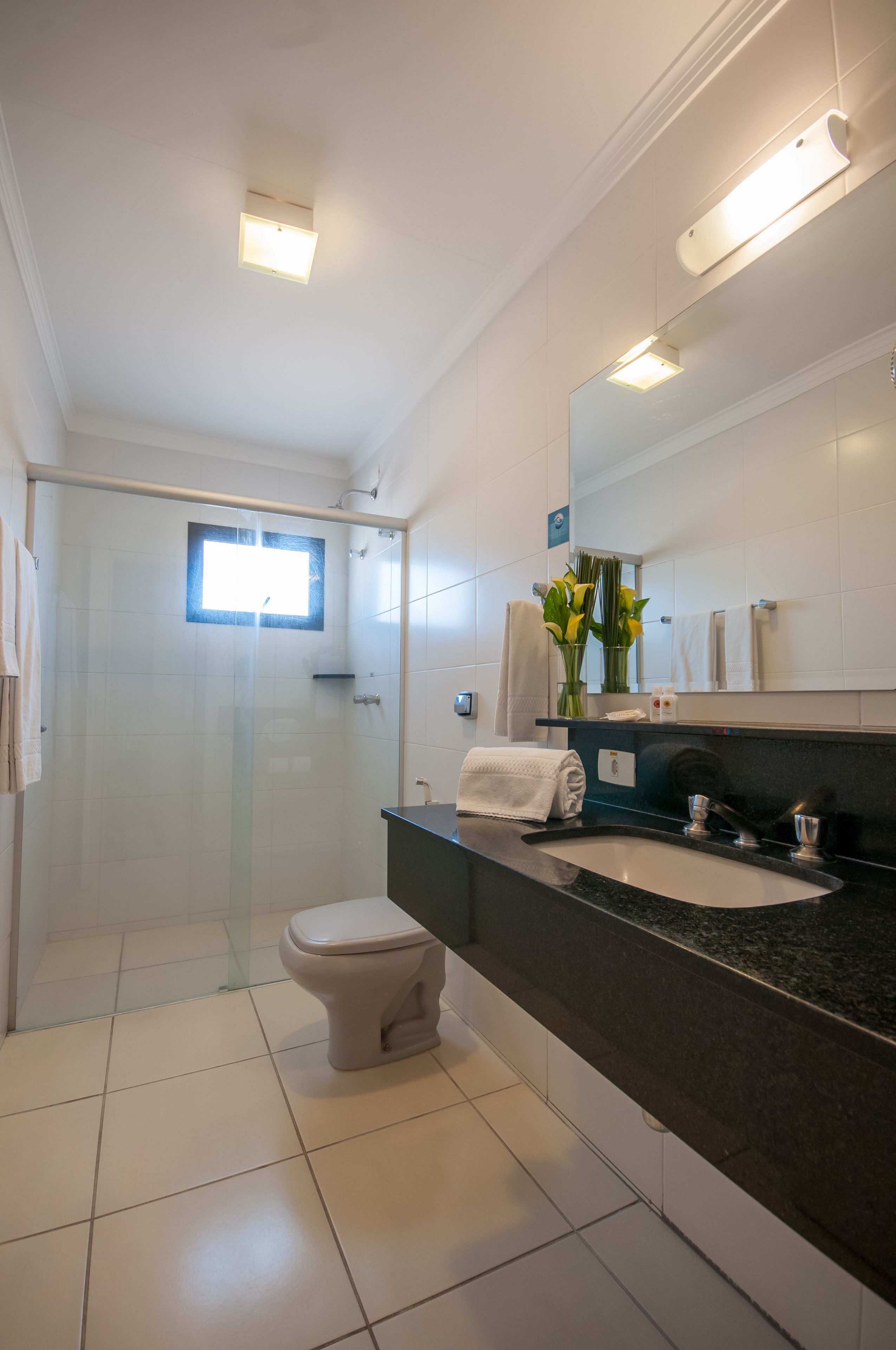 luxury room, 1 king bed | bathroom | shower, rainfall showerhead, towels, soap