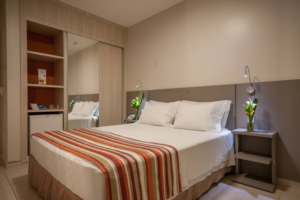Deluxe Room, 1 Queen Bed | 19 bedrooms, hypo-allergenic bedding available, minibar, desk
