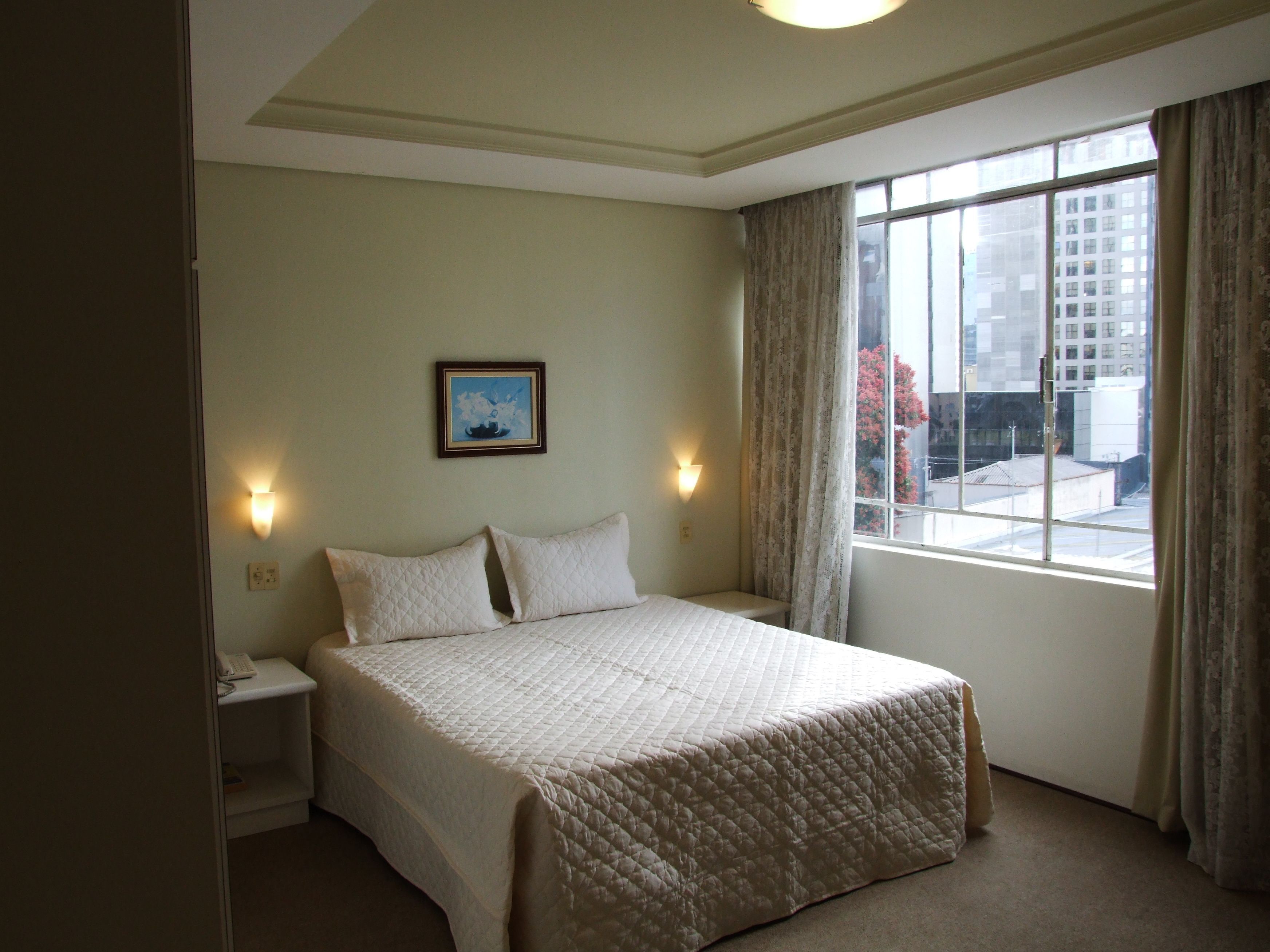 Minibar, desk, laptop workspace, iron/ironing board