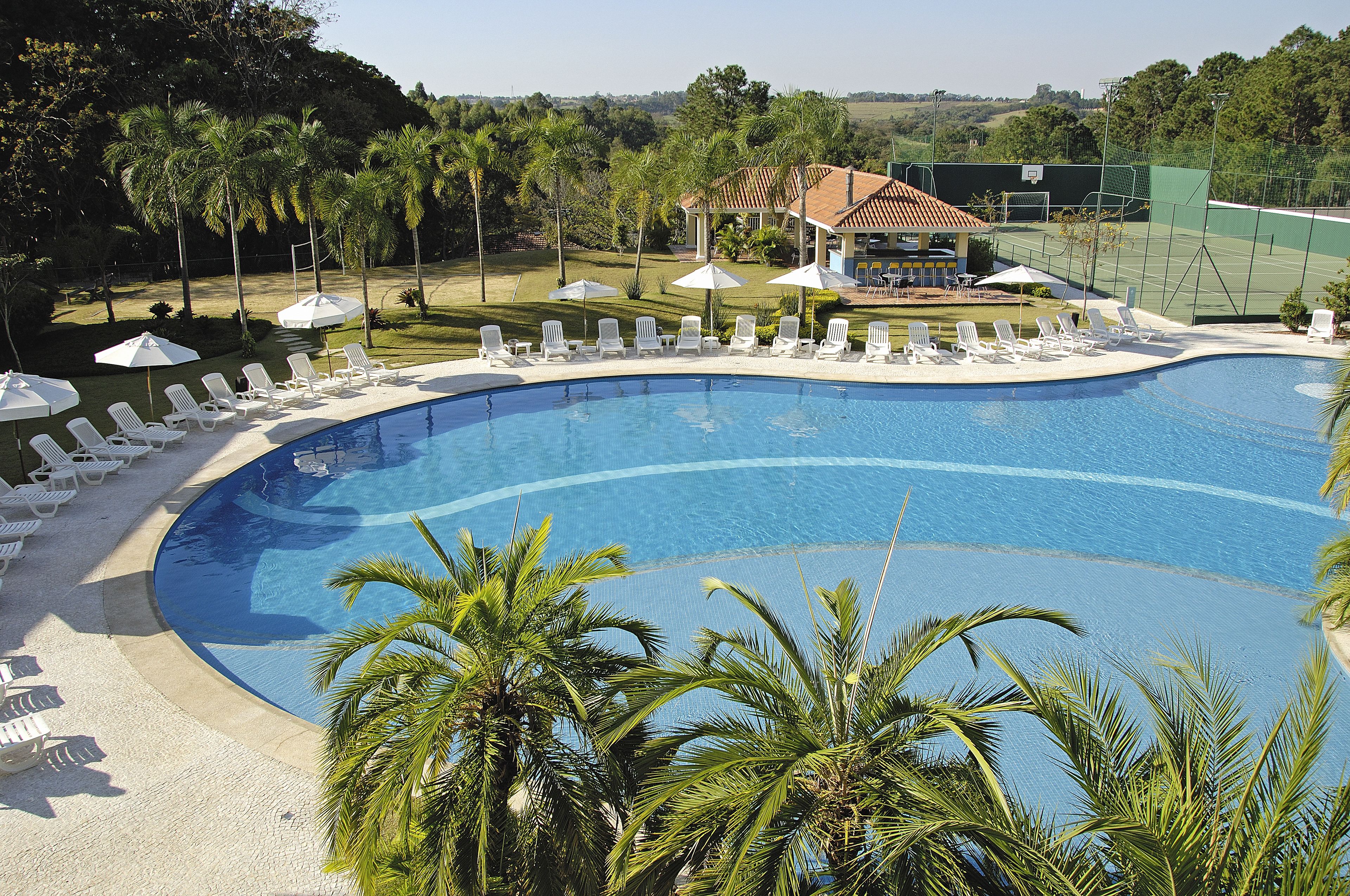 outdoor pool, pool umbrellas, pool loungers