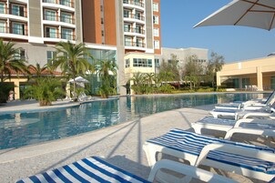 Outdoor pool, pool umbrellas, sun loungers