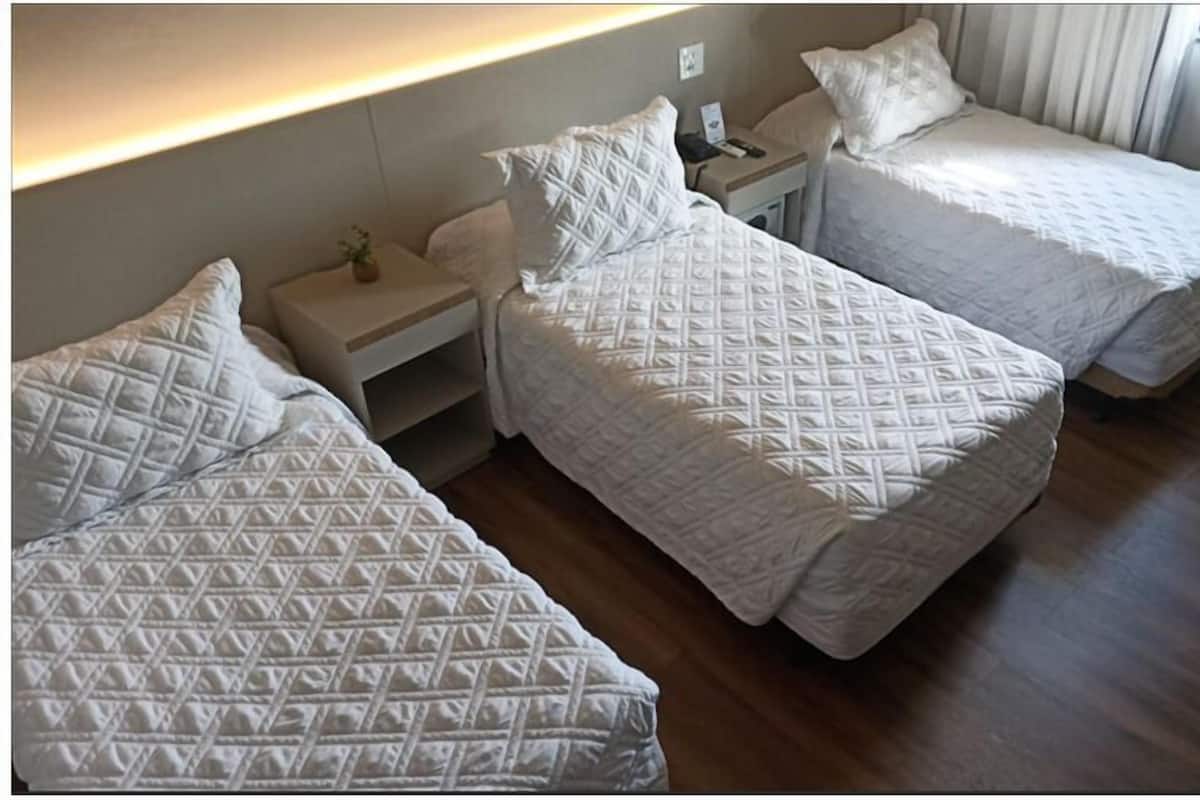 Premium Triple Room, 3 Twin Beds | Minibar, in-room safe, desk, laptop workspace