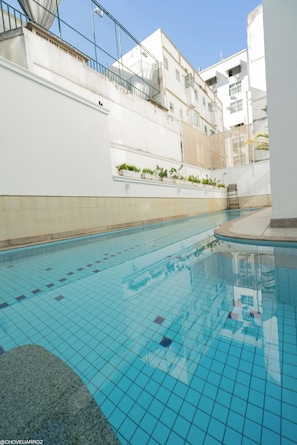 Outdoor pool, open 9:00 AM to 5:00 PM, pool loungers