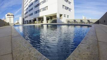 Outdoor pool, open 6:00 AM to 10:00 PM, sun loungers