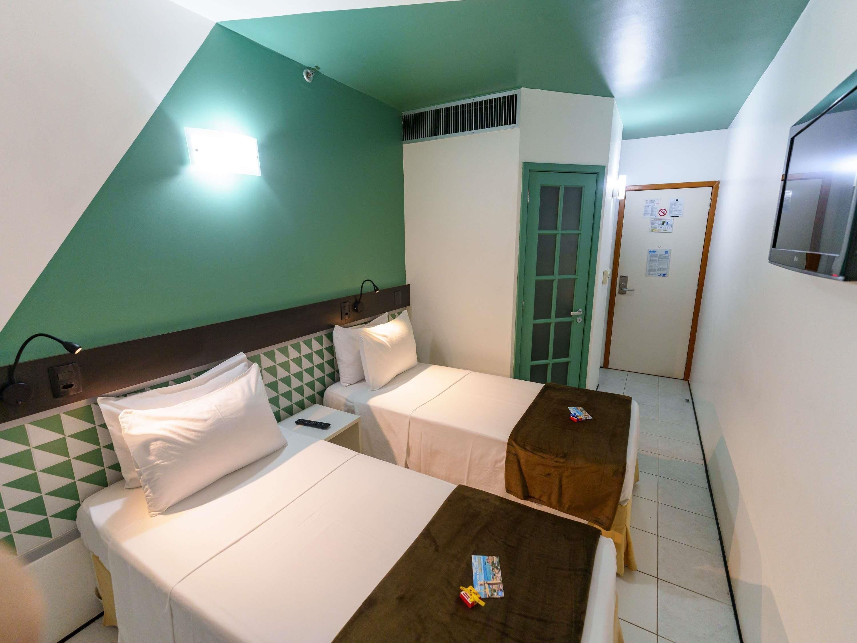 Standard Room, 2 Twin Beds | Minibar, in-room safe, desk, laptop workspace