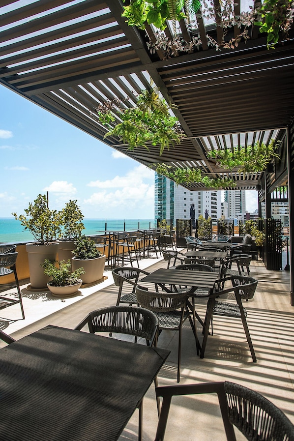 Breakfast, lunch, dinner served; sea views