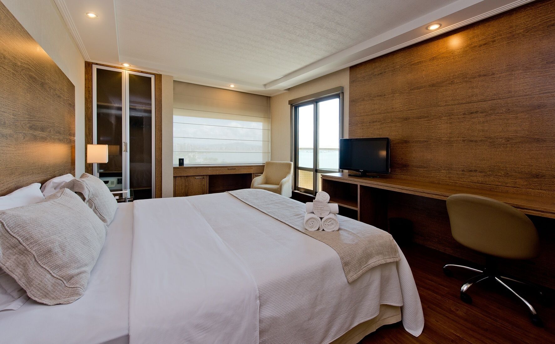 Standard Double Room, Balcony, Partial Sea View | Minibar, in-room safe, desk, blackout drapes