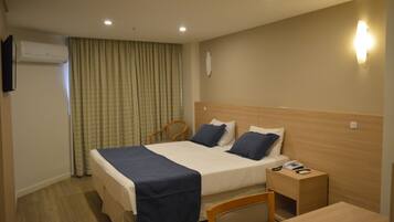 Superior Room | Minibar, in-room safe, desk, blackout drapes