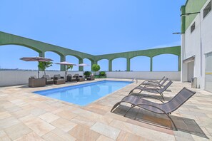 Outdoor pool, pool umbrellas, pool loungers