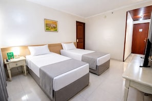 Suíte família | Frigobar, cofres nos quartos, cortinas blackout, Wi-Fi de cortesia