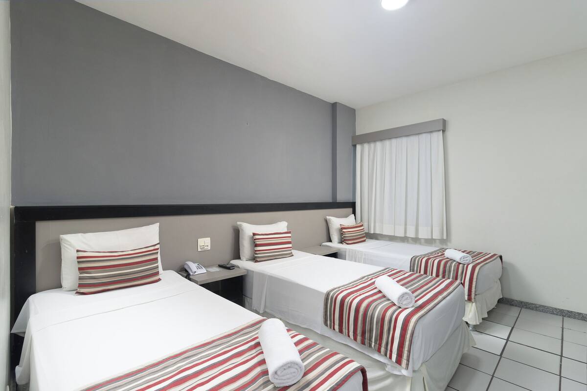 Standard Triple Room, 3 Single Beds | In-room safe, desk, blackout curtains, free cots/infant beds