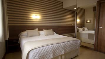 Literie hypoallergénique, minibar, coffres-forts dans les chambres