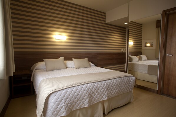 Hypo-allergenic bedding, minibar, in-room safe, desk