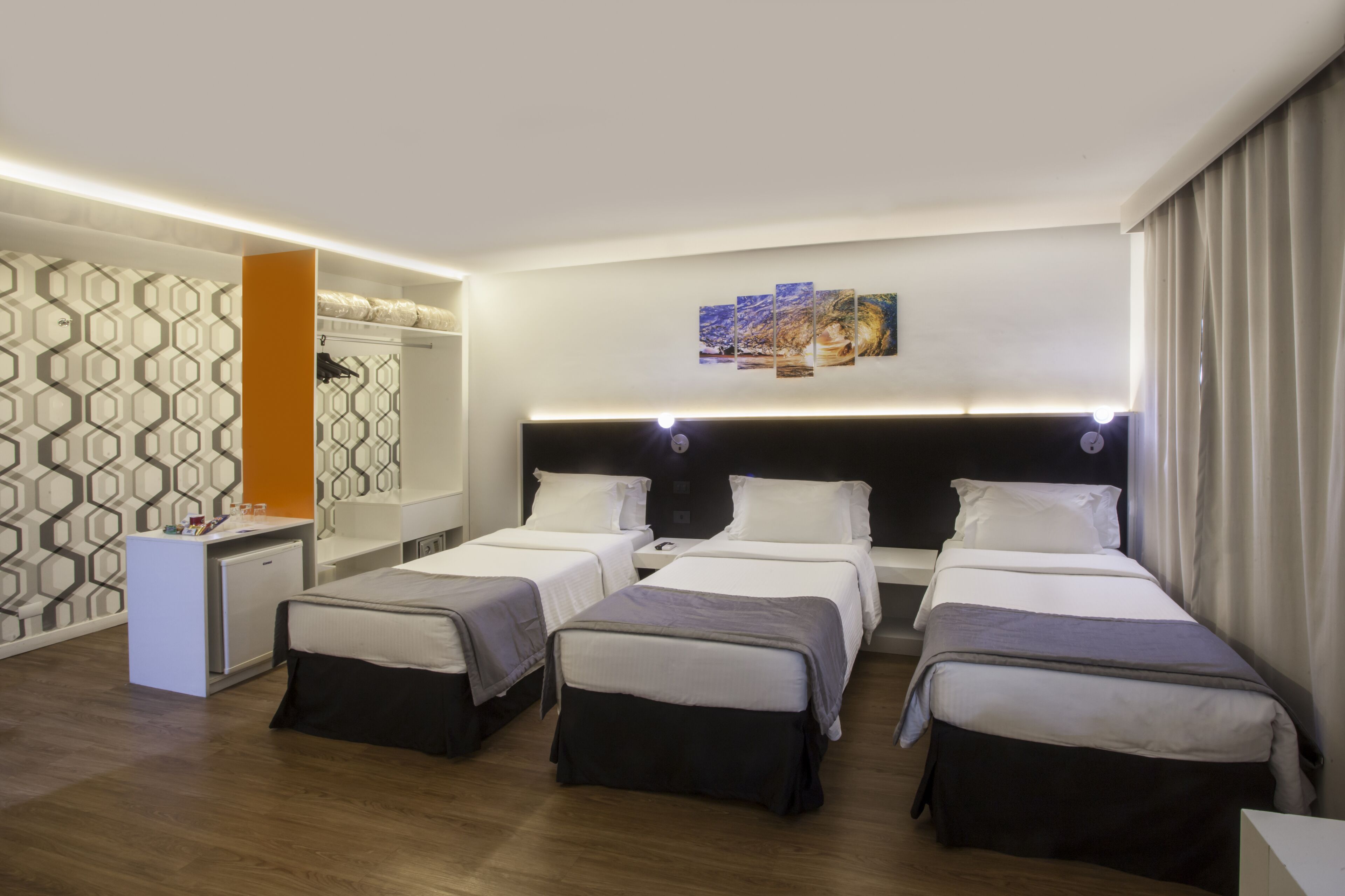 superior triple room | minibar, in-room safe, desk, blackout curtains