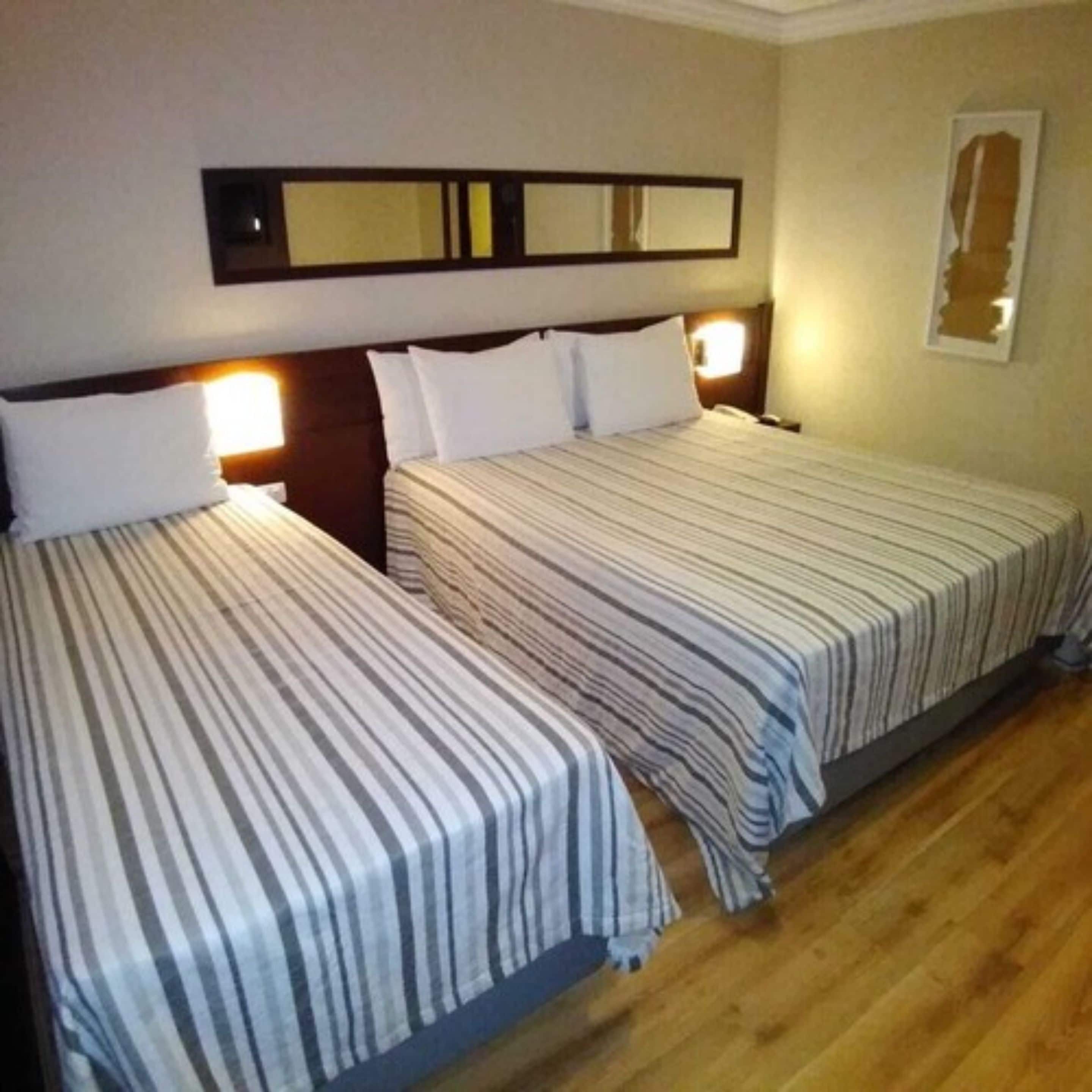 family triple room | 1 bedroom, minibar, in-room safe, desk