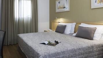 Hypo-allergenic bedding, minibar, in-room safe, desk