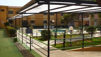 Outdoor pool, pool umbrellas, sun loungers