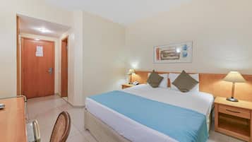 Standard Double Room | Minibar, in-room safe, desk, blackout curtains