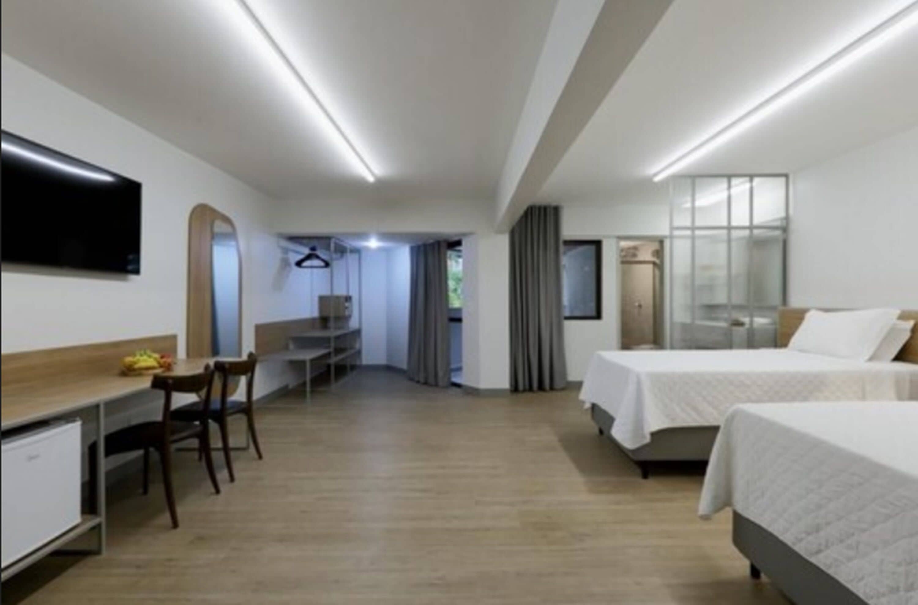 suíte premium twin | 1 bedroom, minibar, in-room safe, blackout curtains