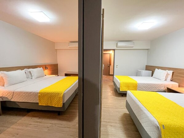 Suíte Deluxe Superior Casal + 2 | Minibar, in-room safe, blackout drapes, soundproofing - San Marino Suite Hotel (Maceió)