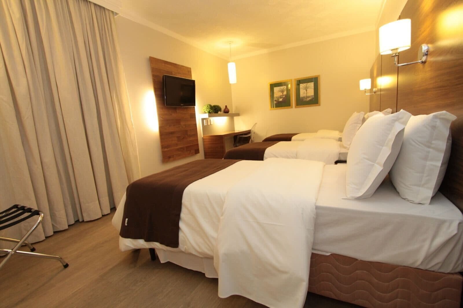 Triplo Prime | Frigobar, cofres nos quartos, escrivaninha, cortinas blackout