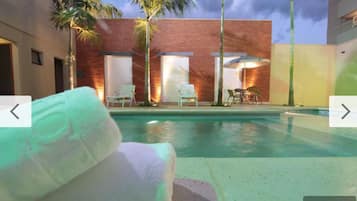 Outdoor pool, open 6:00 AM to 10:00 PM, sun loungers