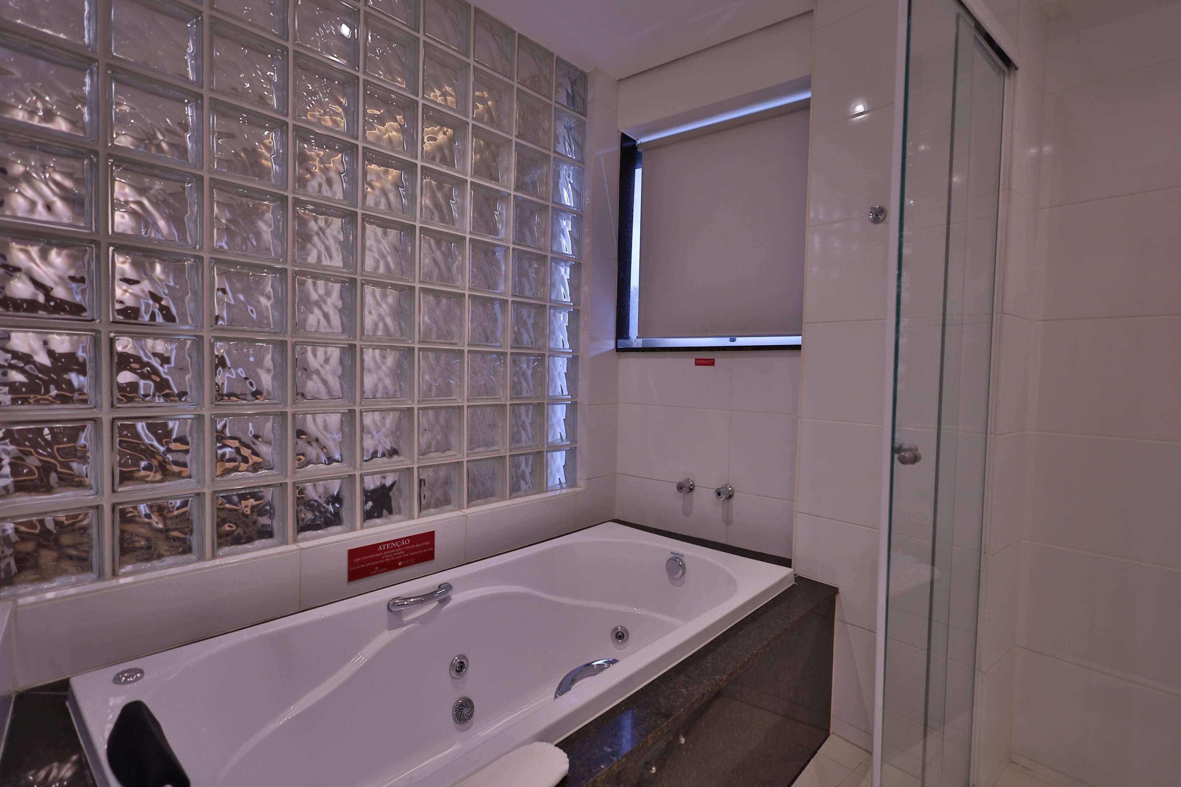 executive room | bathroom | shower, hair dryer, towels