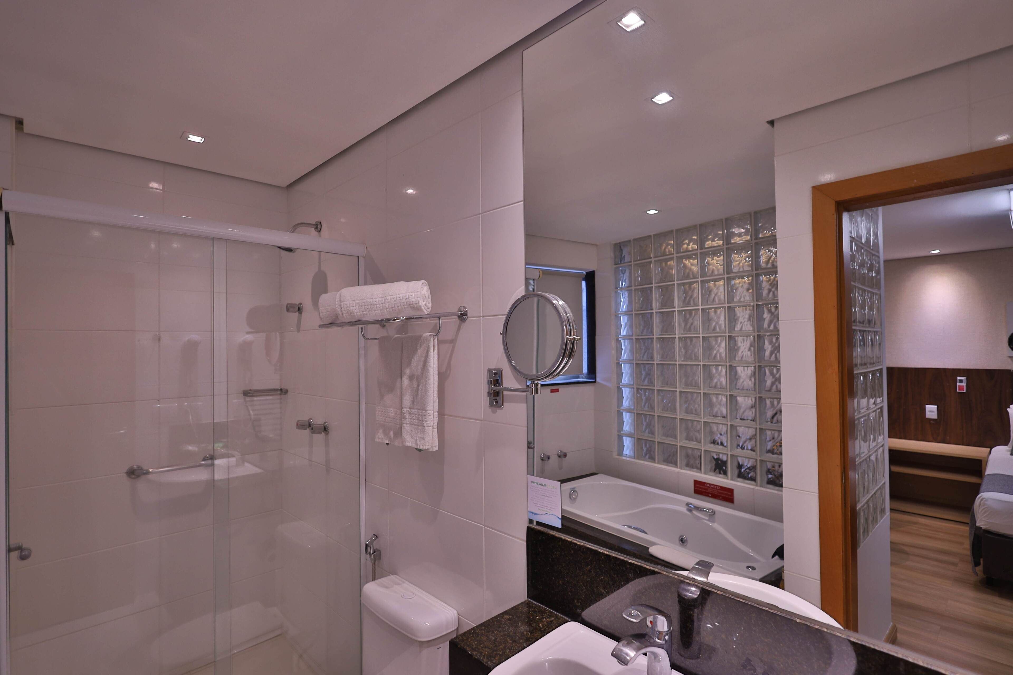 executive room | bathroom | shower, hair dryer, towels