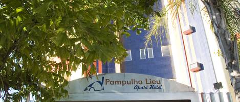 The entrance to the Pamputha Lieu Apart Hotel with a staircase and a covered walkway.