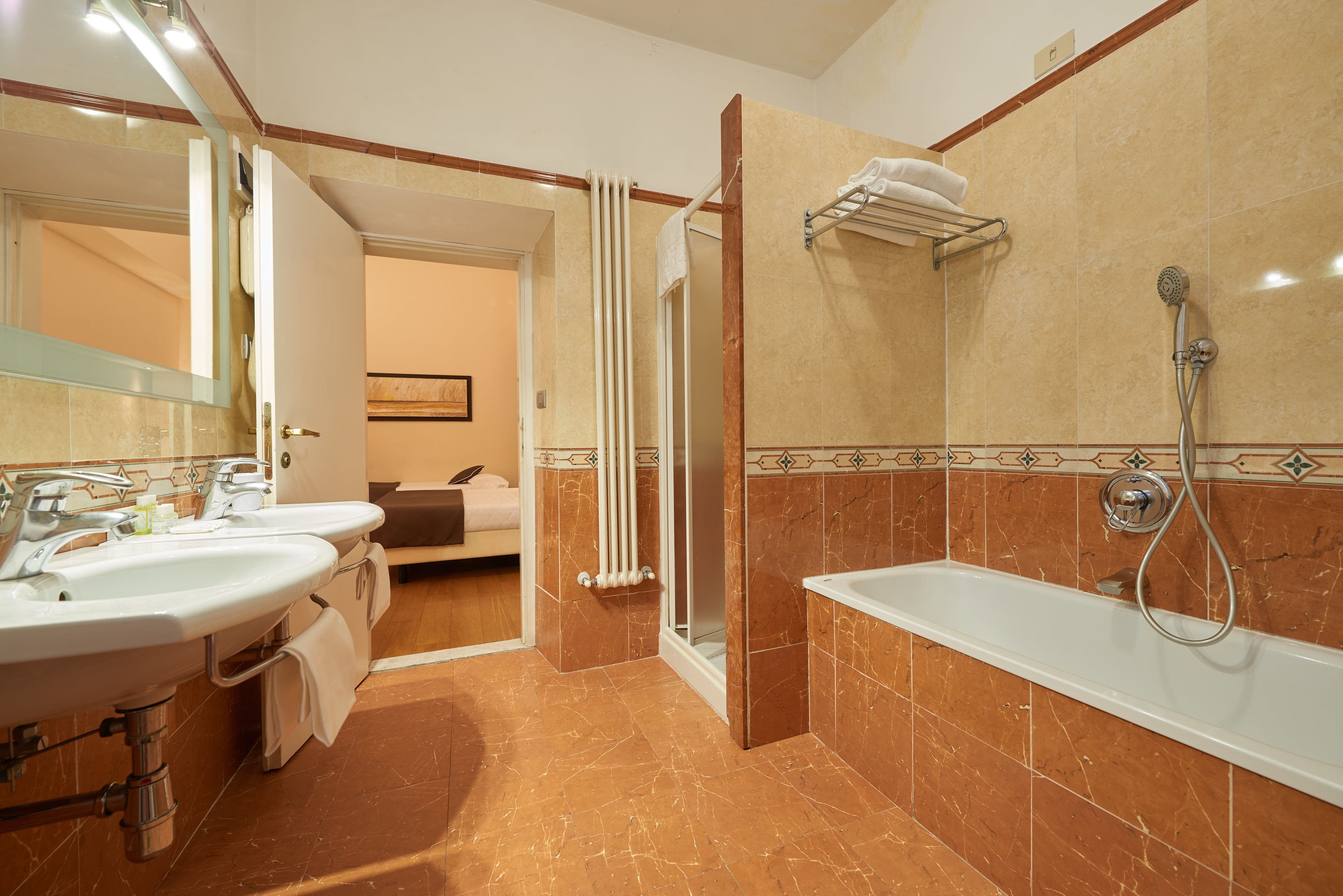 quadruple room | bathroom | free toiletries, hair dryer, bidet, towels