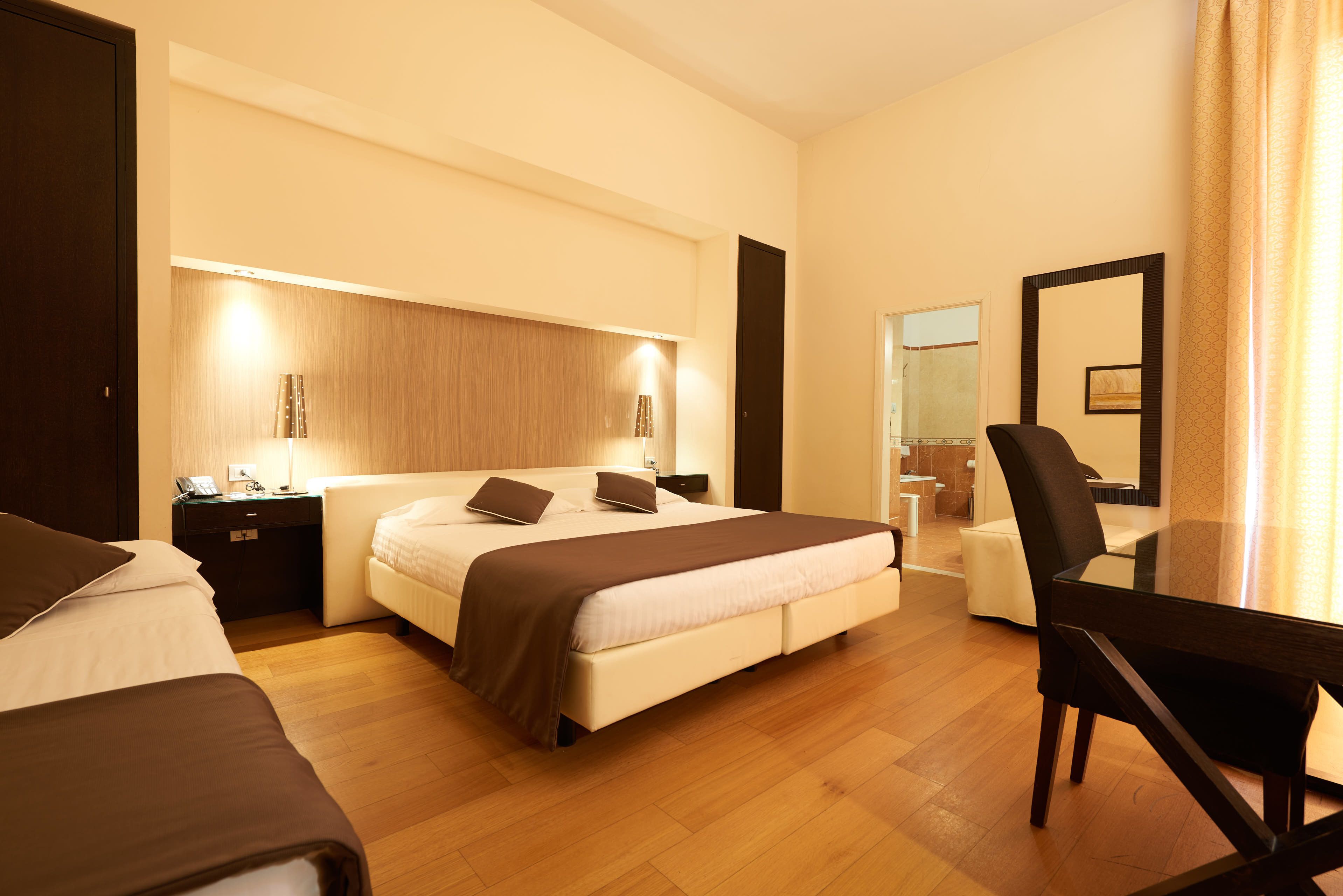 quadruple room | premium bedding, minibar, in-room safe, desk