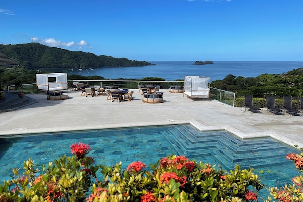 2 outdoor pools, pool umbrellas, sun loungers